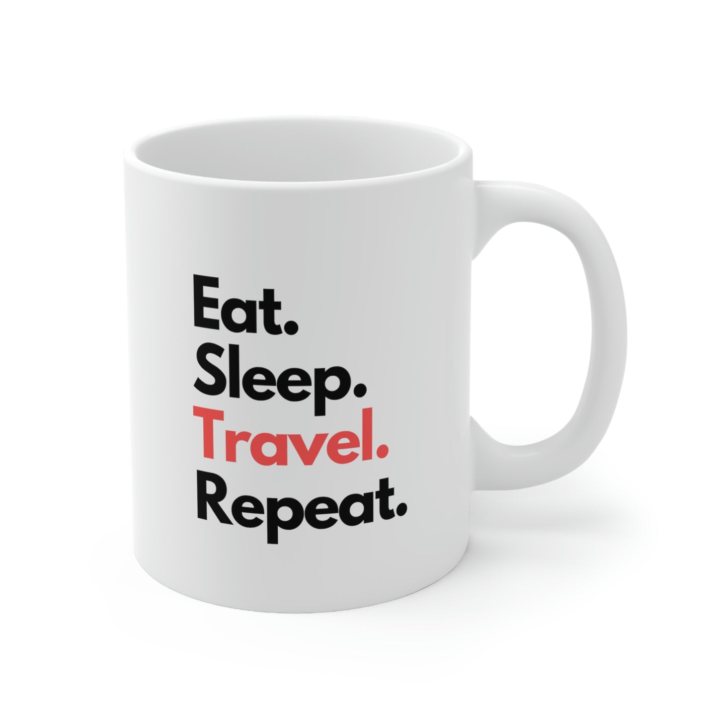 White ceramic mug with words "eat sleep travel repeat" in black and red letters.