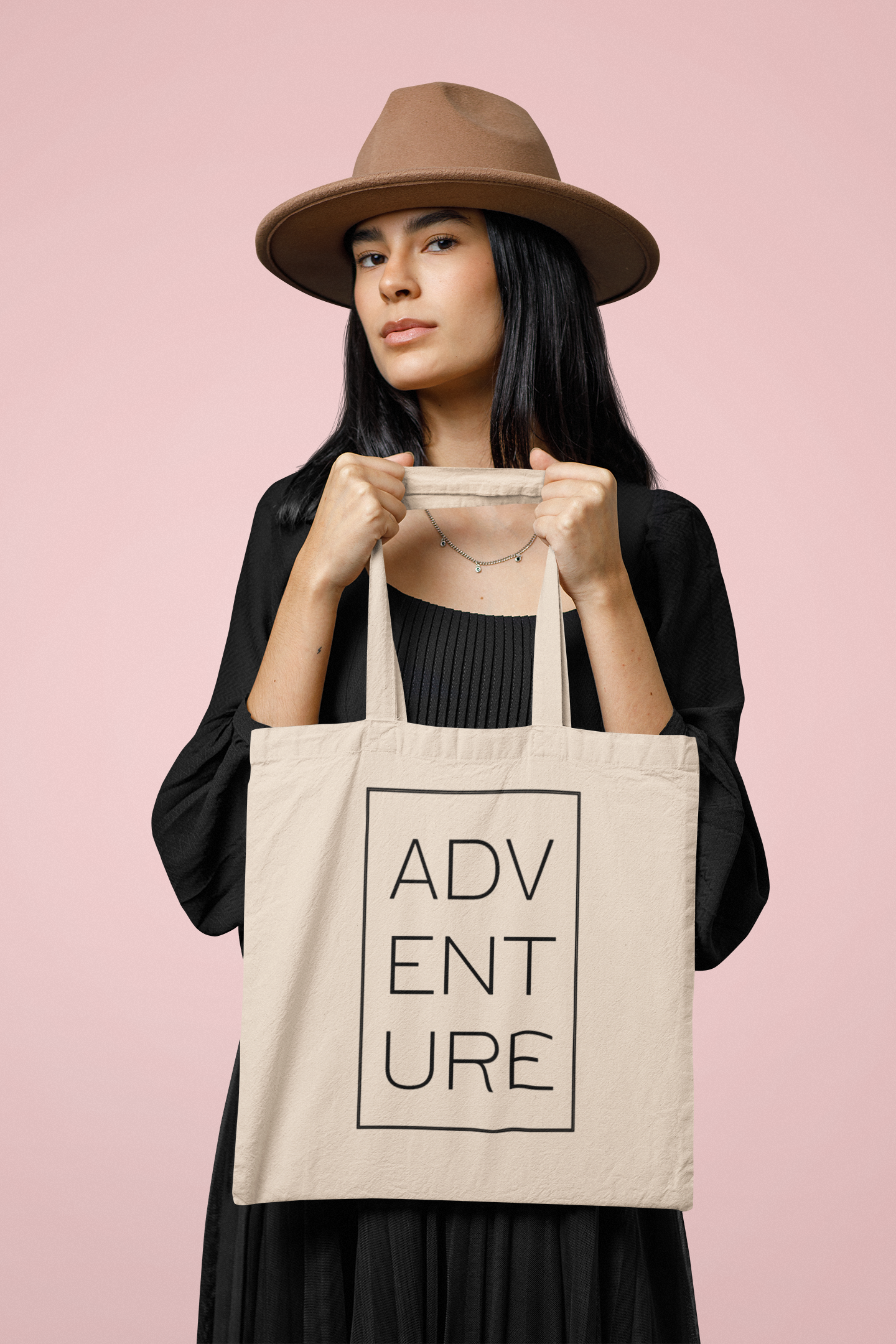 woman carrying a canvas tote bag