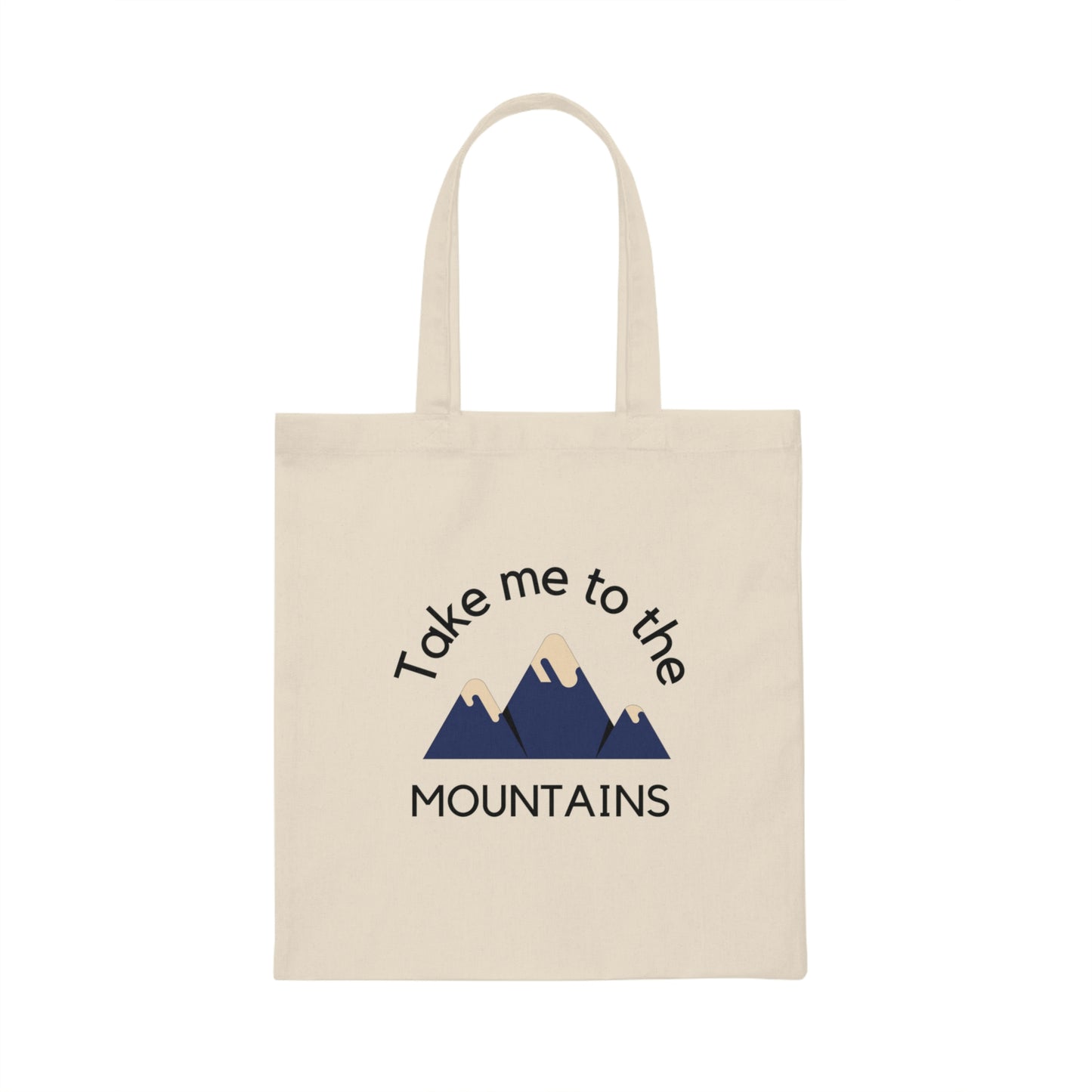 Canvas tote bag on white background with minimalist drawing of mountains and words "take me to the mountains". 